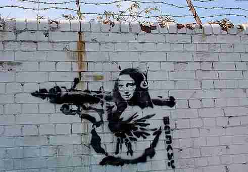 Image by Mona Lisa with Bazooka, Banksy. Image with helmets on wall of Palestine.