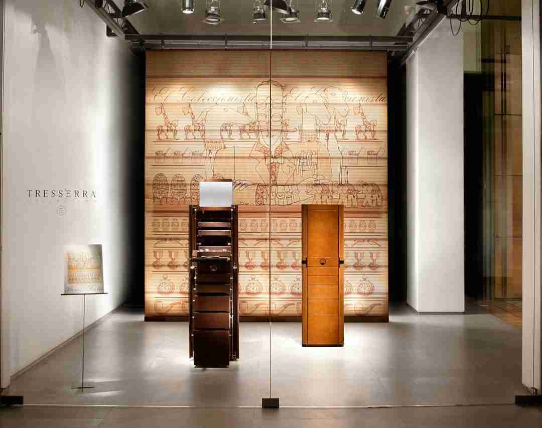 Image of one of the windows of the Tresserra Showroom with 2 units of the collector's furniture (open and closed).