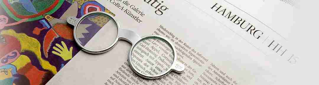 filosofia-philippi-design-1080x290px.jpg Image of Philippi Design's Glasses magnifying glass on a Hamburg newspaper.